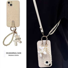 Camellia Flower and Puppy Pearl Charm Leather Crossbody Lanyard Phone Case for iPhone 13 Series